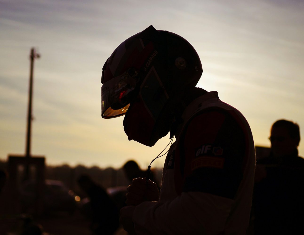 Driver in helmet